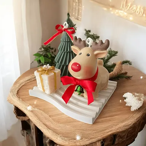 Rena decorativa com laço vermelho sobre bandeja